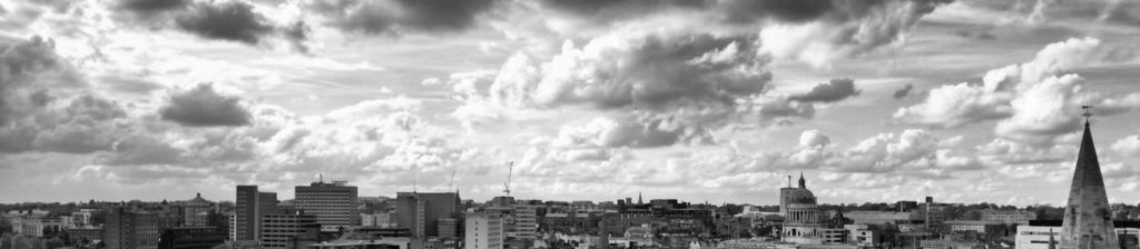 Nottingham City Skyline, featuring clouds and photographed in black and white